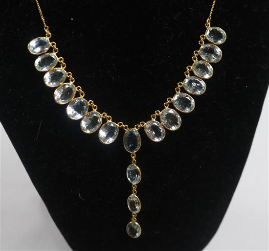 A modern 14ct gold and aquamarine set drop necklace, 48cm.